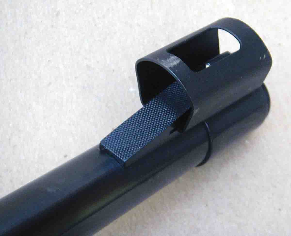 The front sight is hooded with an interchangeable bead front.